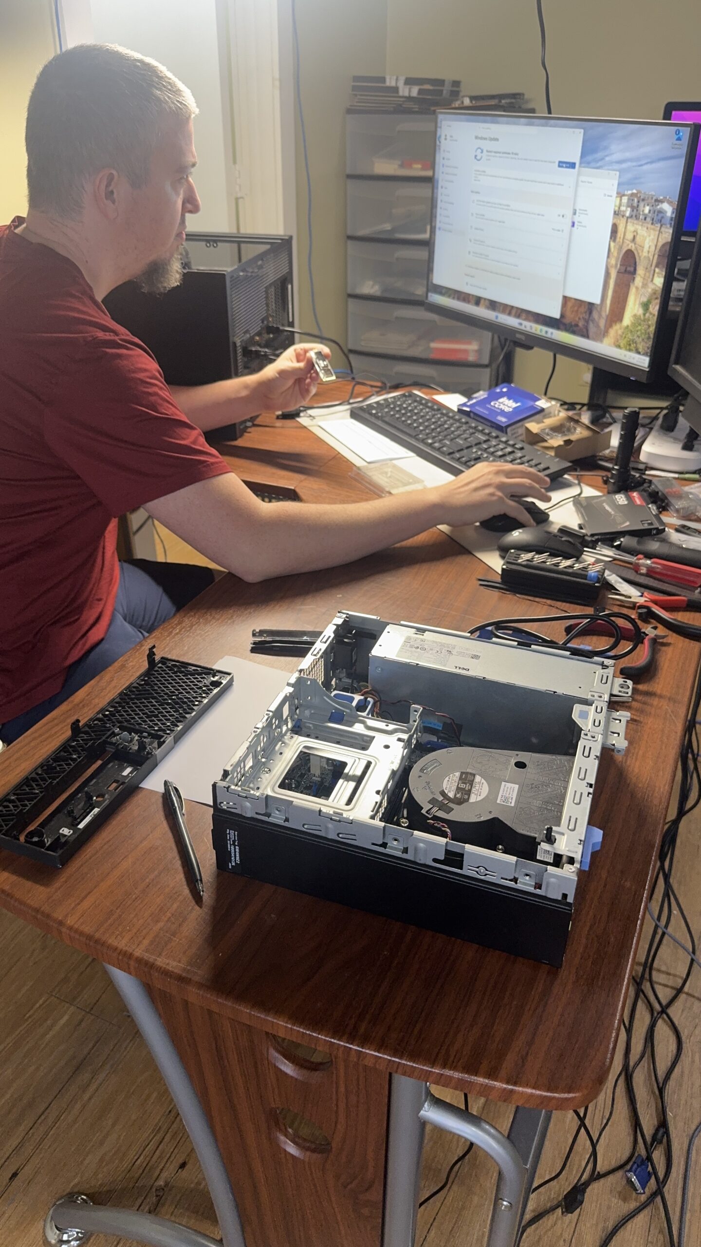 Technician performing system setup and optimization prepping for data transfer at MyTown Computer Service in Mt. Pleasant MI.